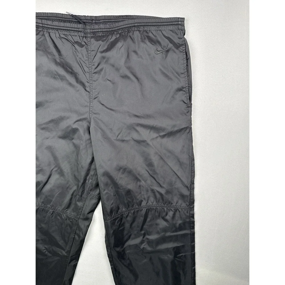 Vintage 90s Nike Black Nylon Track Pants Swoosh Zip Leg Windbreaker L